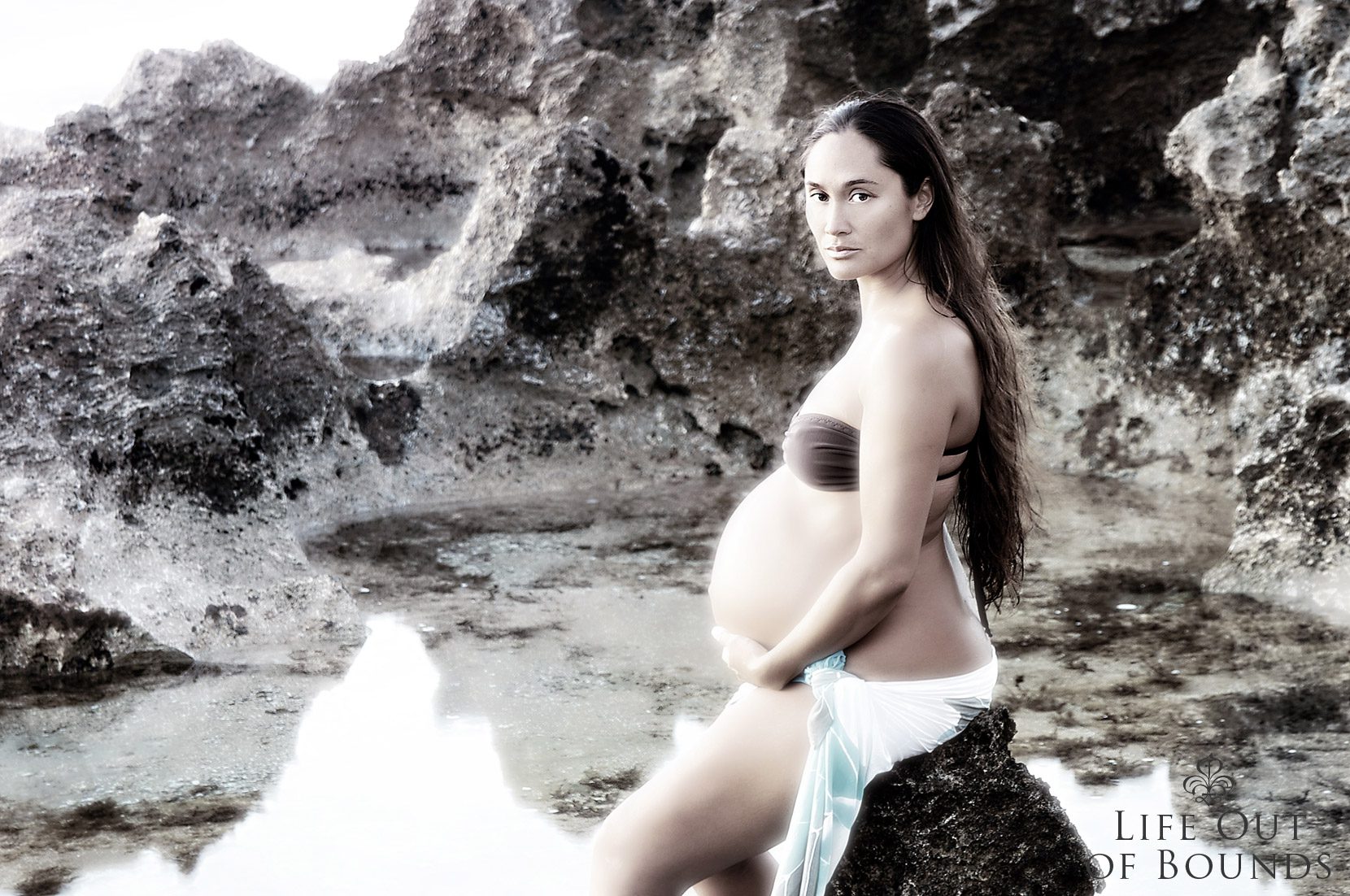 Beautiful-Hawaiian-pregnant-woman-standing-by-the-ocean-Haleiwa-Oahu-Hawaii