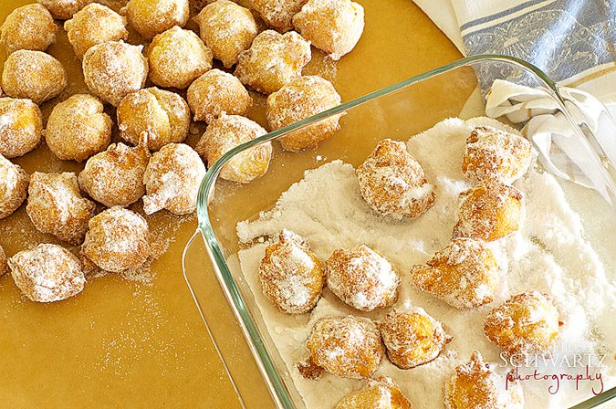 Rolling-the-fritters-in-sugar