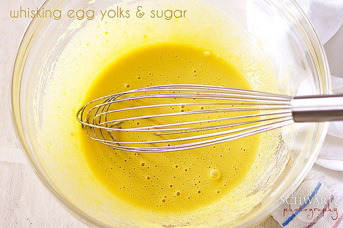 Whipping-egg-yolks-and-sugar-to-make-chocolate-cake
