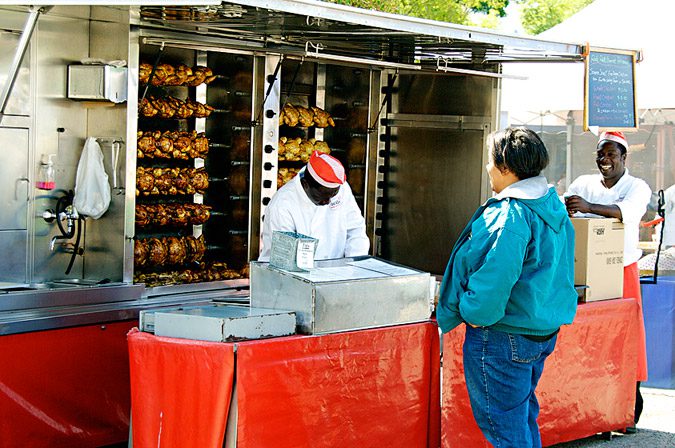 Roast-chicken-vendor-at-the-farmers-market-in-San-Rafael-Marin-County-California