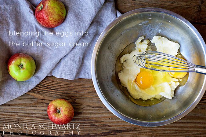 Blending-eggs-butter-and-sugar-to-make-apple-cake