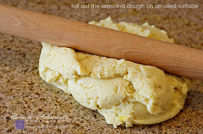 Rolling-out-semolina-dough-to-make-gnocchi-alla-Romana-recipe