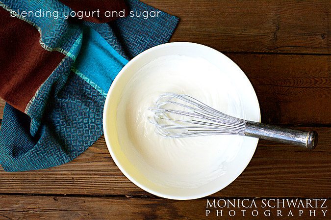 Blending-yogurt-and-sugar-to-make-yogurt-cake-with-maple-figs-recipe