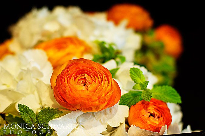 White-hydrangea-and-orange-buttercup-bouquet-with-fresh-mint-by-Ornamento