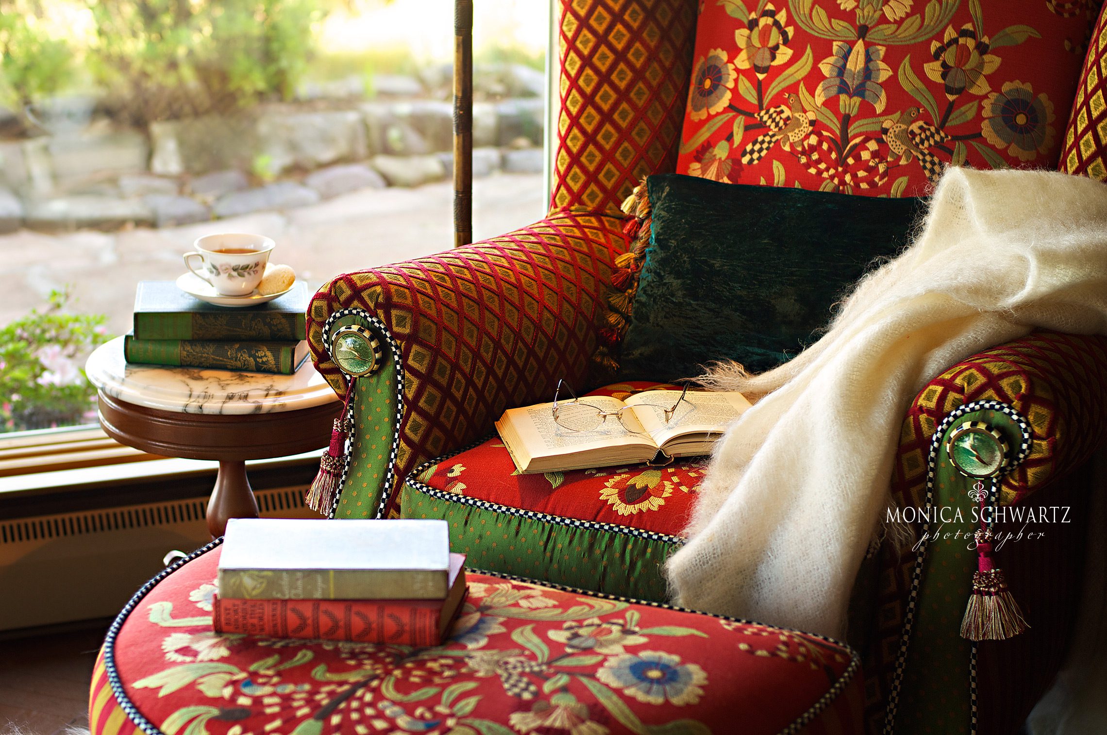 MacKenzie-Childs-armchair-with-blanket-book-and-tea