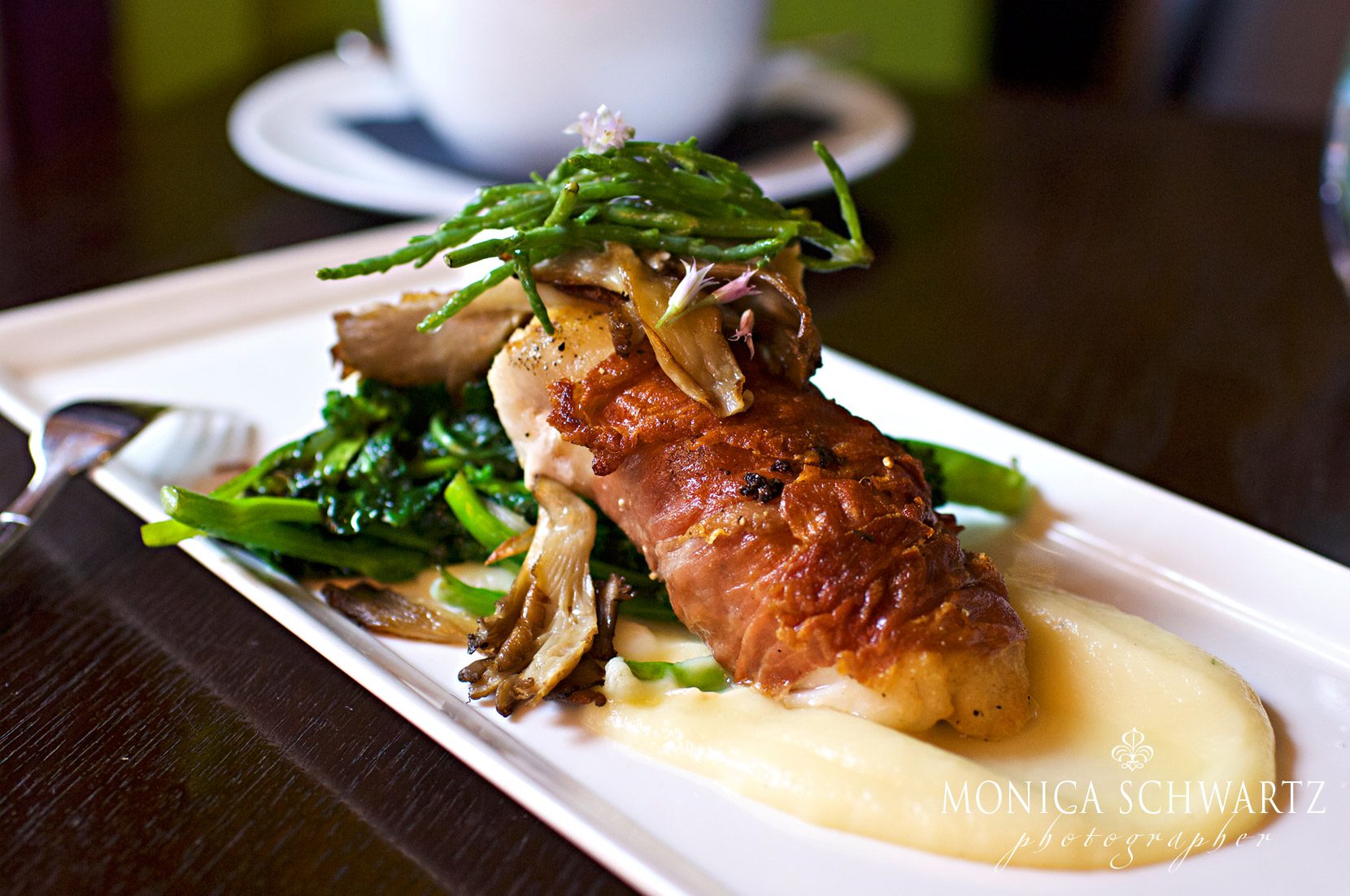 Prosciutto-wrapped-Cod-fillet-with-parsnip-puree-broccolini-and-trumpet-mushrooms-at-Basil-Restaurant-in-Carmel-by-the-Sea-California