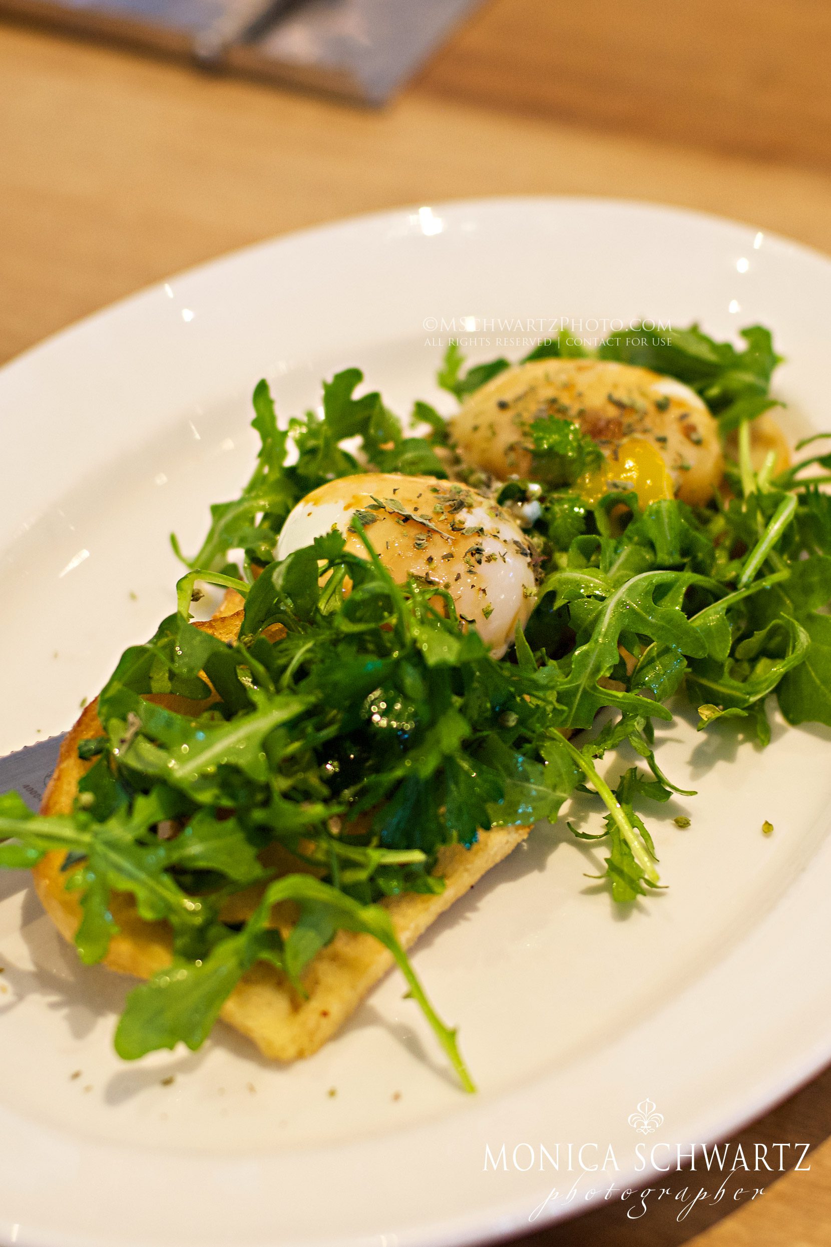 Poached-eggs-with-Arugula-and-dried-oregano-on-Levain-toast-at-the-Shed-in-Healdsburg-California