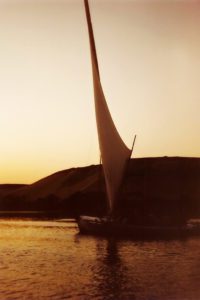 Felucca-on-the-Nile-near-Aswan-Egypt-at-sunset-photography-by-Monica-Schwartz
