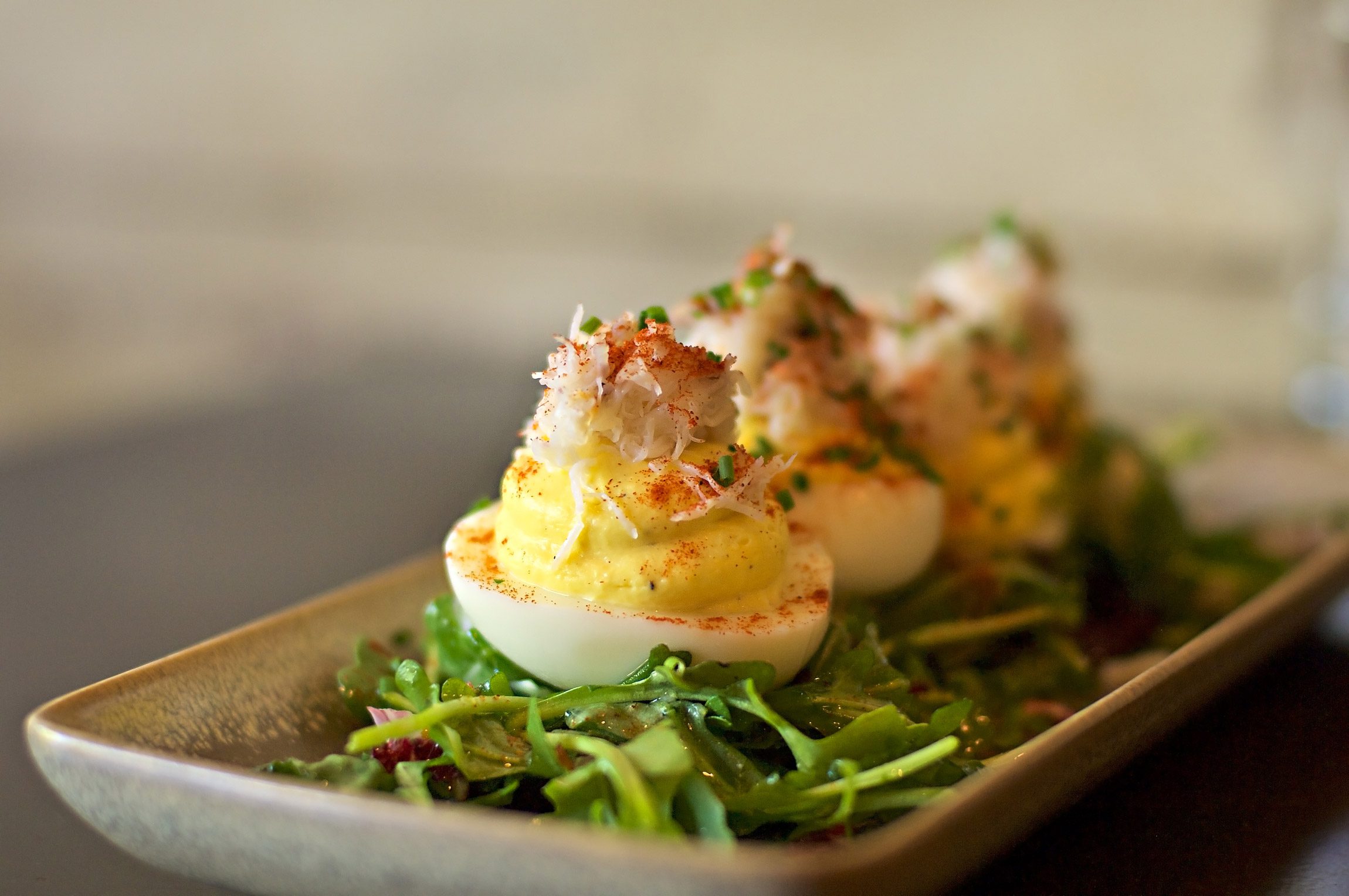 Dungeness-crab-deviled-eggs-at-OSO-restaurant-in-Sonoma-California-photography-by-Monica-Schwartz