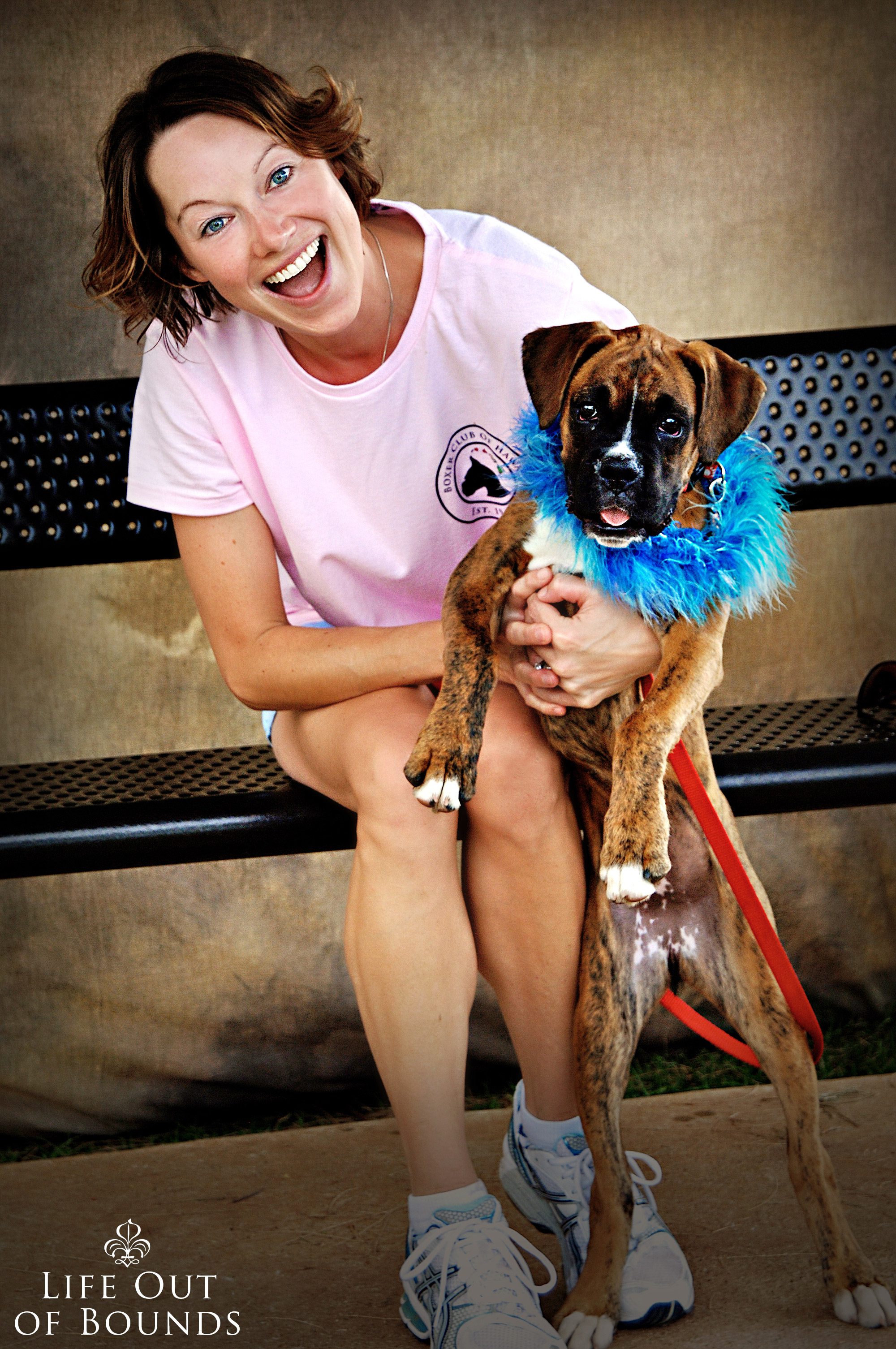 Young-woman-with-her-Boxer-puppy-in-Honolulu-Hawaii