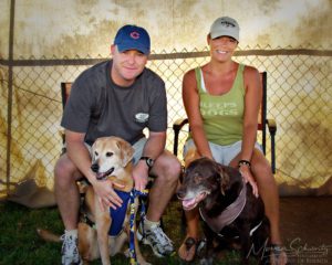 Gary-and-Laura-Reidenbach-with-their-dogs-Maggie-and-Molly-at-the-Hawaii-Kai-Dog-Walk-event-in-Honolulu-Hawaii
