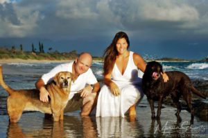 Family-and-dogs-portrait-at-North-Beach-in-Kaneohe-Oahu-Hawaii