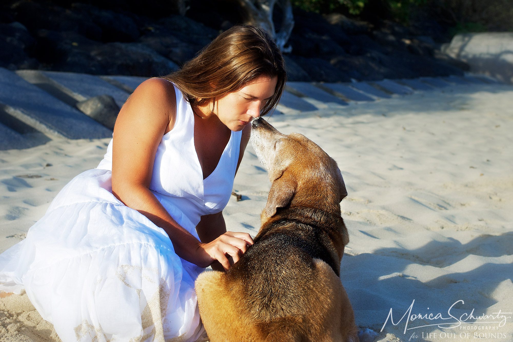 Molly-dog-with-her-human-mommy-at-North-Beach-in-Kaneohe-Oahu-Hawaii