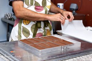 Preparing-to-unmold-the-chocolate-bars-at-Madre-Chocolate-Oahu-Hawaii