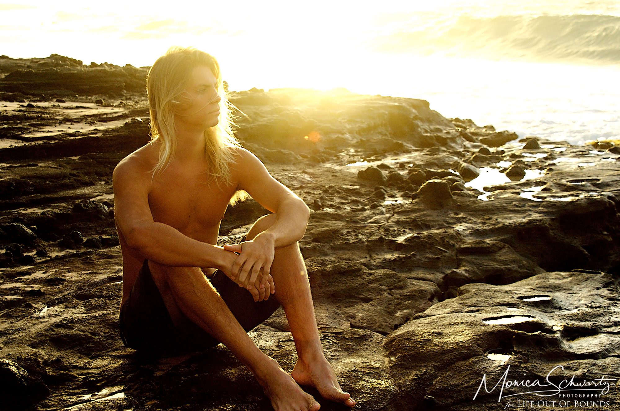 Surfer-Chey-Moseman-modeling-at-sunrise-at-Sandy-Beach-Honolulu-Oahu-Hawaii