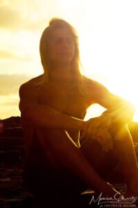 Surfer-Chey-Moseman-modeling-at-sunrise-at-Sandy-Beach-Honolulu-Oahu-Hawaii