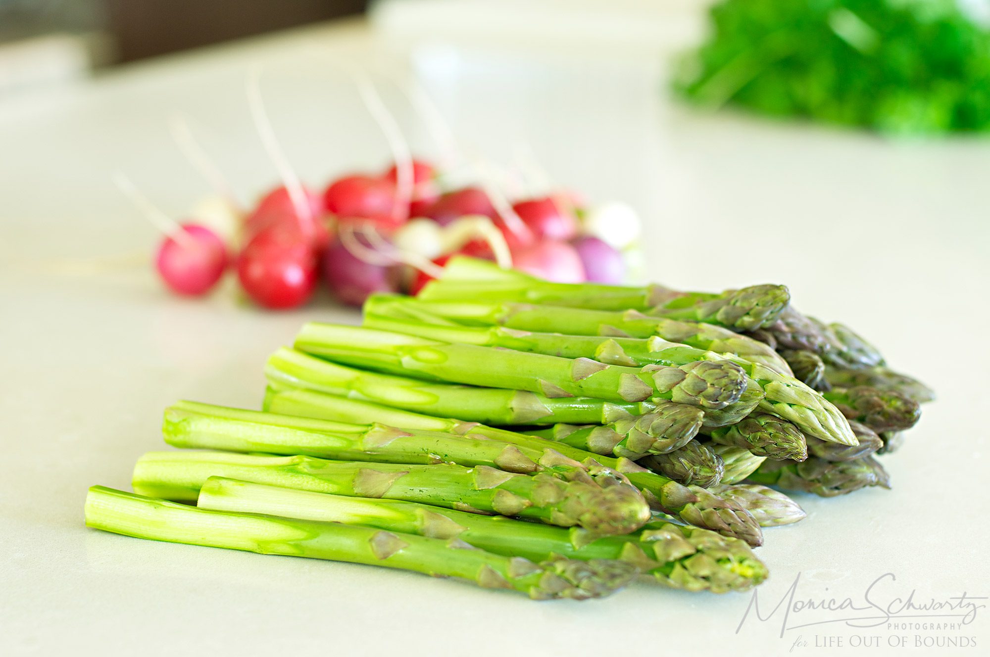 Raw-asparagus-peeled-and-ready-for-Asparagus-Mimosa-Salad-recipe