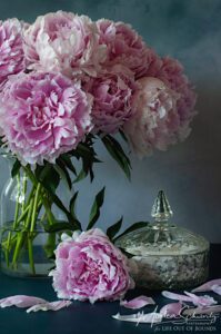 Beautiful-pink-peonies-with-vintage-crystal-candy-dish-still-life