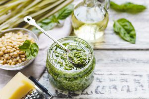 Traditional Genoese Pesto sauce - recipe - with basil, pine nuts, garlic, extra virgin olive oil and Parmesan