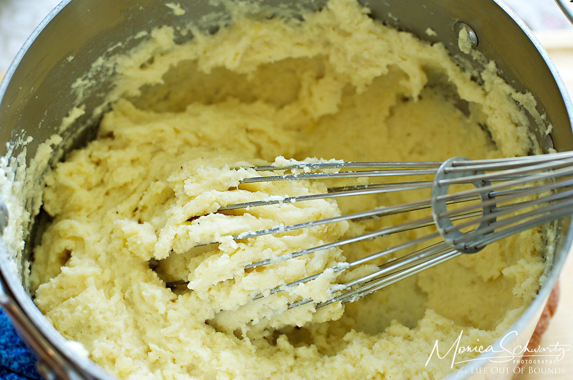 Mixing the semolina dough to make Gnocchi alla Romana, recipe