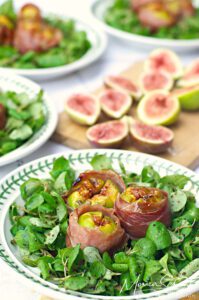 Speck-wrapped Grilled Figs on a bed of Maché salad dressed in Balsamic Vinaigrette