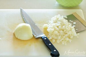 Chopping onion to make soup