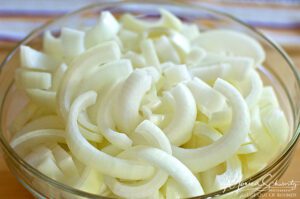 Bowl of sliced onions to make Maui (French) Onion Soup | recipe