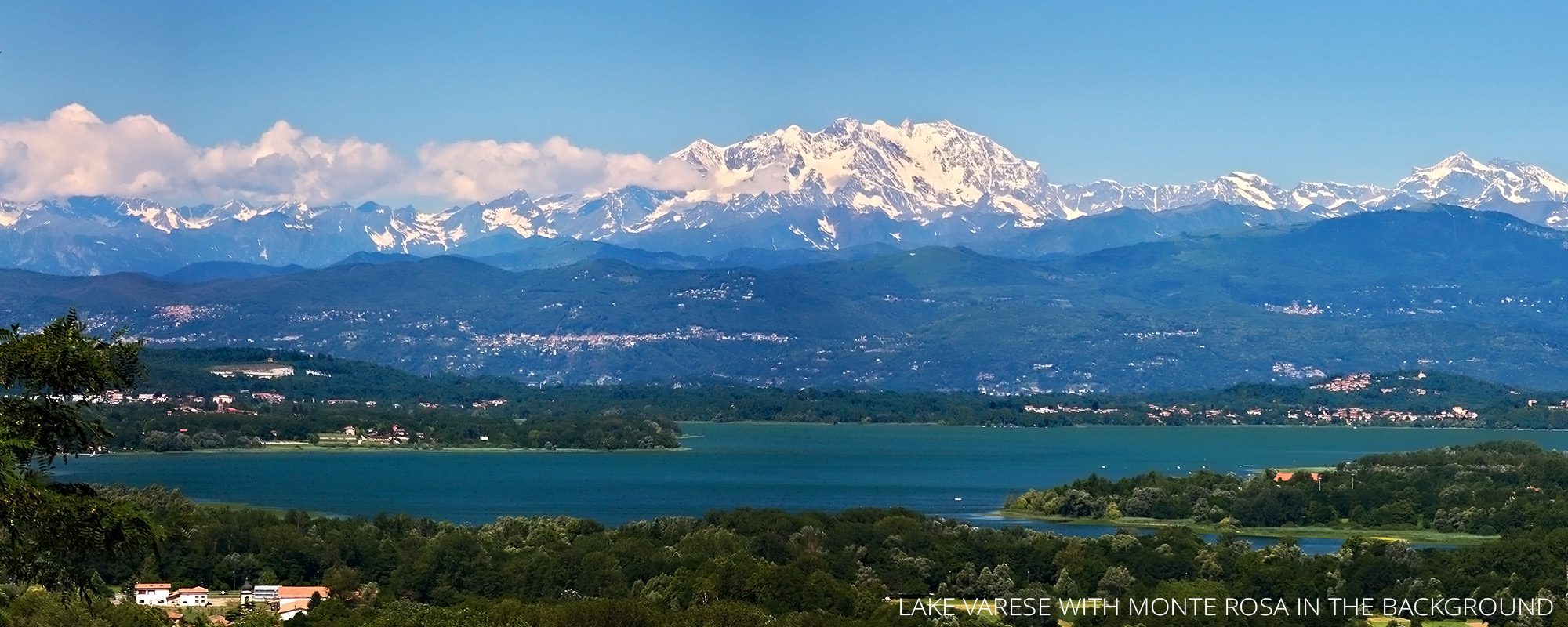 Panoramic view of Lake Varese with Monte Rosa and Alps in the background, Northern Italy