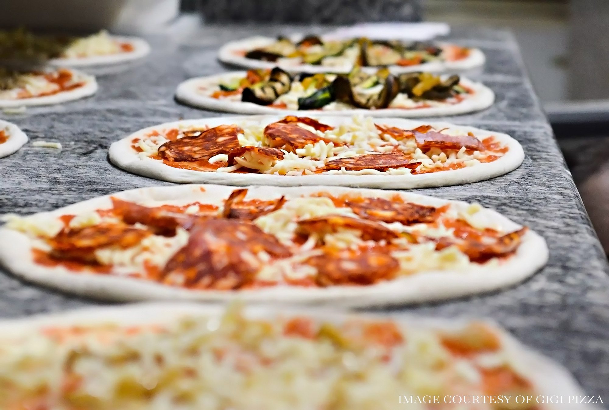 Making pizza at Gigi Pizza in Induno Olona (Varese), Italy
